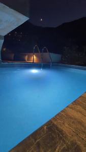 Bazén v ubytování Limone ithaca nebo v jeho okolí