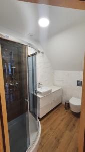 Kúpeľňa v ubytovaní Apartament Orkisz