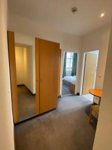 Postel nebo postele na pokoji v ubytování Kolbeck Rooms