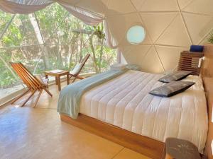 Postel nebo postele na pokoji v ubytování Ku kuk Glamping