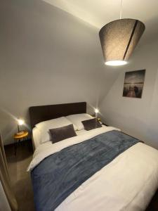 a bedroom with a large bed in a room at Ferienhaus International in Bad Harzburg +38 photos