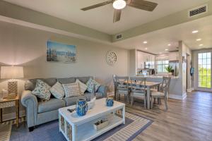 a living room with a couch and a table at Coastal-Zen Ruskin Retreat Less Than 1 Mi to Beach! in Ruskin