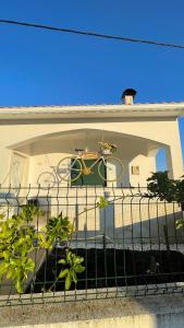 a fence in front of a house at Vale Encantado - Alojamento Local in Mação