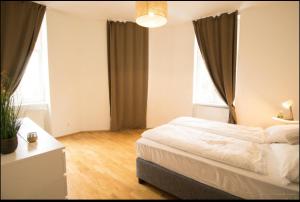Łóżko lub łóżka w pokoju w obiekcie Gemütliches Stadtnest l LF16