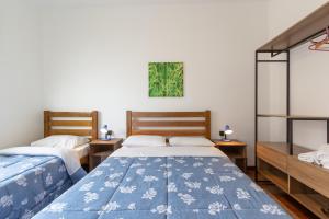 Ένα ή περισσότερα κρεβάτια σε δωμάτιο στο Casas no Tatuapé, 2 ou 3 quartos e Garagem