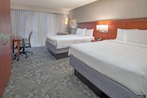 Postel nebo postele na pokoji v ubytování Sonesta Select Seattle Bellevue Redmond + 23 fotografií
