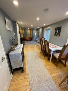 a living room with a dining room table and chairs at Northern Liberties Retreat in Philadelphia