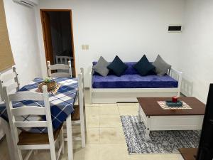 Posezení v ubytování Apart Del Este 1