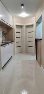 A kitchen or kitchenette at Pansion Eden