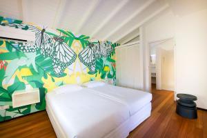 Uma cama ou camas num quarto em Papagayo Beach Resort
