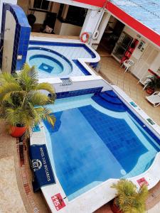 Bazén v ubytování Comodas Habitaciones Hotel Bucaros nebo v jeho okolí