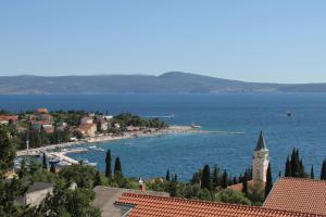 a view of a small island in a body of water at Apartments by the sea Selce, Crikvenica - 3240 in Selce