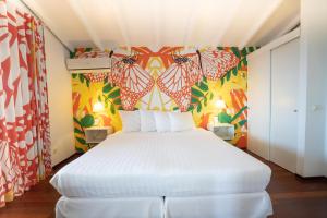 Uma cama ou camas num quarto em Papagayo Beach Resort