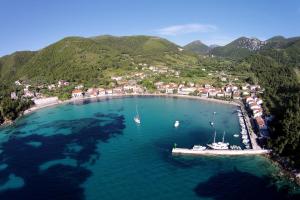 an aerial view of a harbor with boats in the water at Apartments by the sea Zuljana, Peljesac - 10207 in Žuljana