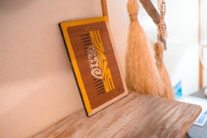 Douceur Tropicale Proximité plage et commercesにあるベッド