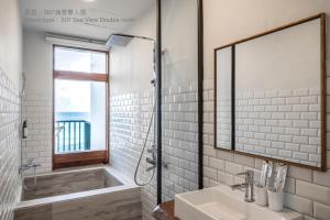 Ένα μπάνιο στο Chuanfanrock Haku Beach Days Inn