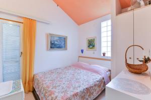 Postel nebo postele na pokoji v ubytování Apartment Vir - Pedinka 294f