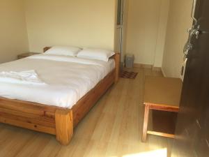 Katil atau katil-katil dalam bilik di Beli Guest House