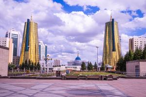 a group of tall buildings in a city at Belon Lux Hotel in Astana