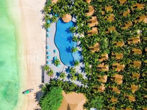 an overhead view of a swimming pool with plants at Phi Phi CoCo Beach Resort in Phi Phi Islands
