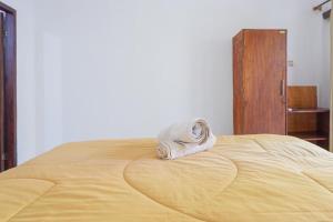 Ein Bett oder Betten in einem Zimmer der Unterkunft Bukit Garden Gili Trawangan