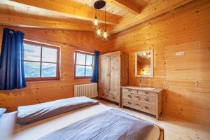 Posteľ alebo postele v izbe v ubytovaní Bergchalet Refugium Martius