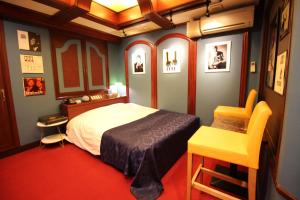 Postel nebo postele na pokoji v ubytování Hotel OLDSWING Adult Only