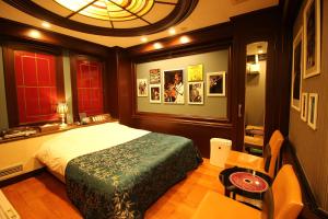 Ένα ή περισσότερα κρεβάτια σε δωμάτιο στο Hotel OLDSWING Adult Only