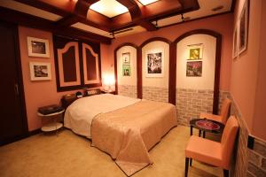 Ένα ή περισσότερα κρεβάτια σε δωμάτιο στο Hotel OLDSWING Adult Only