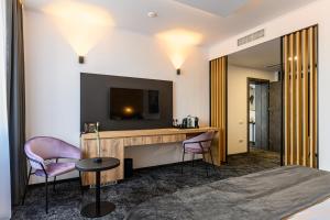 Kuchyň nebo kuchyňský kout v ubytování B THE HOTEL
