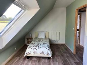 Posteľ alebo postele v izbe v ubytovaní Maison vue mer à Plouguerneau