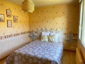 Posteľ alebo postele v izbe v ubytovaní Maison vue mer à Plouguerneau