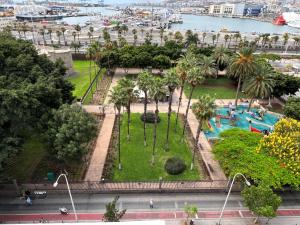 a park filled with lots of green grass and trees at Hotel Matilde in Las Palmas de Gran Canaria