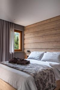מיטה או מיטות בחדר ב-Suite Mia