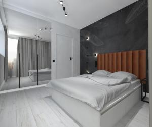 Posteľ alebo postele v izbe v ubytovaní Stylowe Apartamenty Plewiska