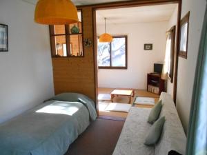 Postel nebo postele na pokoji v ubytování Villa Nugget Inn