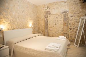 Posteľ alebo postele v izbe v ubytovaní Casa di Gio