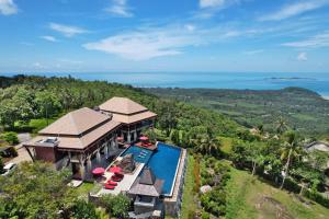 an aerial view of a villa with a swimming pool at Samui Ridgeway Villa - Private Retreat with Panoramic Sea Views in Koh Samui