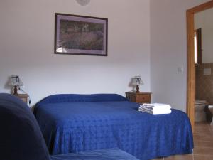 Cama o camas de una habitación en La Collina di Peppino