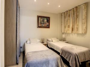 Posteľ alebo postele v izbe v ubytovaní Beautiful 1 bedroom with garden on the Croisette 254