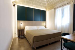 Łóżko lub łóżka w pokoju w obiekcie Mazzini Accommodation