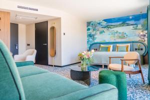 Un lugar para sentarse en Hotel D Bulle - La Gruyère