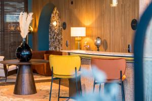 Un lugar para sentarse en Hotel D Bulle - La Gruyère
