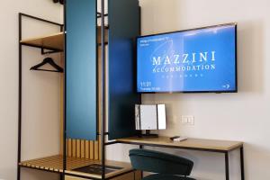 Telewizja i/lub zestaw kina domowego w obiekcie Mazzini Accommodation