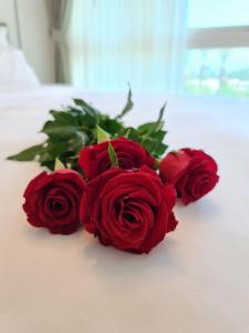 Postel nebo postele na pokoji v ubytování Rose Suite