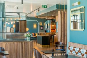 Un lugar para sentarse en Hotel D Bulle - La Gruyère