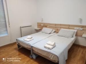 Voodi või voodid majutusasutuse LOS OBARENES toas