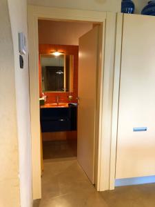 a bathroom with a sink and a mirror at Casa Chiassarello in Roccastrada