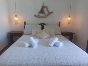 Postel nebo postele na pokoji v ubytování Dovas house
