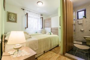 Posteľ alebo postele v izbe v ubytovaní Villa Venus